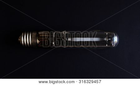 Sodium Lamp On A Black Background Top View Close-up