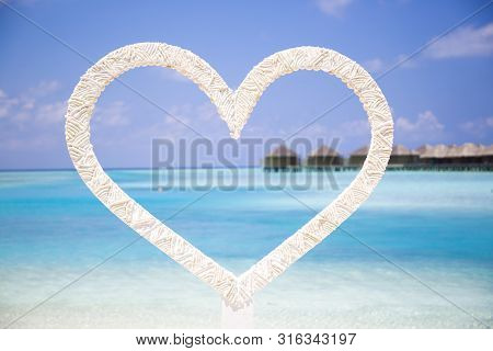 Shape Of A Heart In The Beach In Maldives.