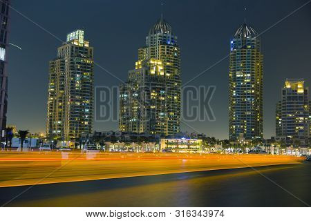 Long Exposure Of Dubai Marina At Night. Beautiful Lights