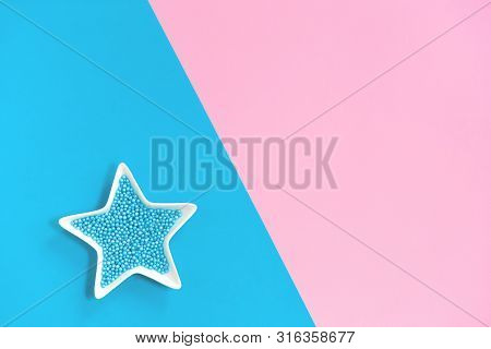 Blue Nonpareils Cake Candy Sprinkles In Two White Star Bowls On Pink Blue Background In Flat Lay Wit