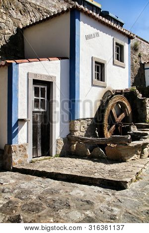 Azenhas Do Mar, Sintra, Lisbon, Portugal- March 19, 2019: Beautiful And Colorful Waterwheel In Azenh