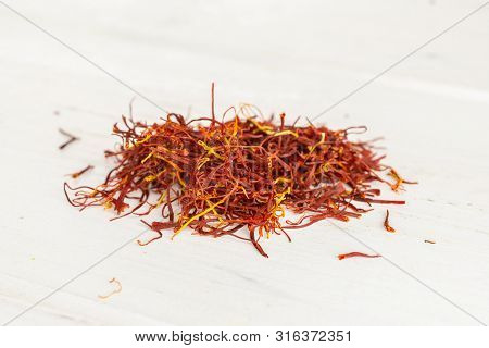 Lot Of Whole Dry Shaffron Thread Heap On White Wood