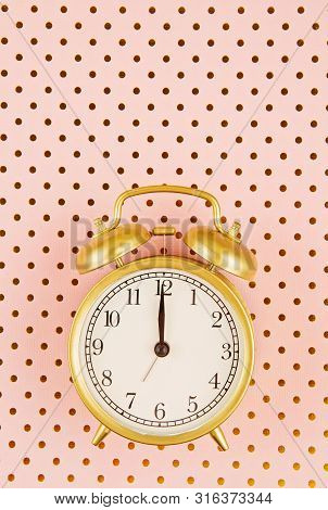 Flat Lay With Vintage Alarm Clock Over The Bastel Background