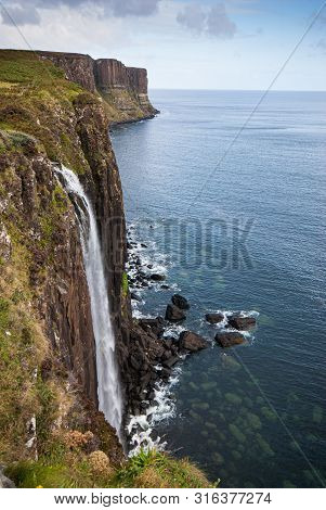 The Famous Kilt Rock With The Mealt Falls At The Isle Of Skye In The Highlands Of Scotland