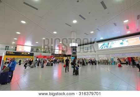 London England - May 31, 2019: Unidentified People Travel At Gatwick Airport London England.