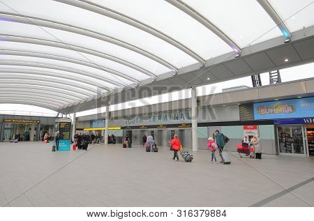 London England - May 31, 2019: Unidentified People Travel At Gatwick Airport London England.