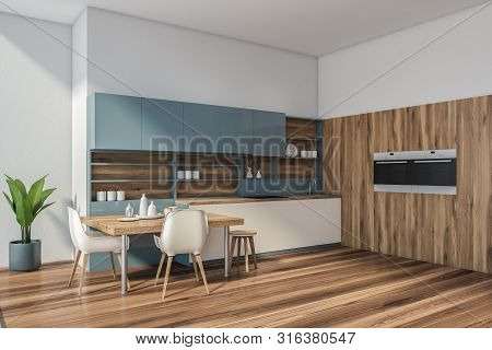 Blue And Wooden Kitchen Corner With Stoves