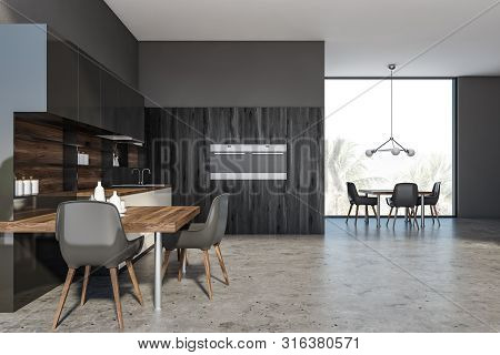 Dark Wooden Kitchen Interior With Table