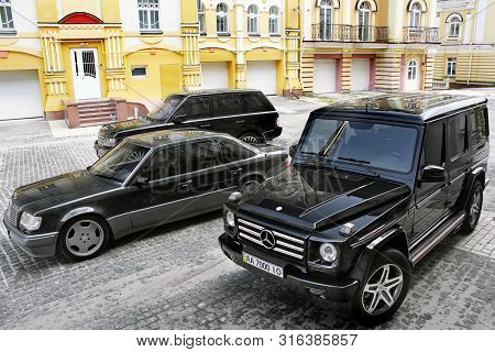 Kiev, Ukraine - September 6, 2013: Mercedes E500 W124 Wolf On The Background Of Beautiful Old Houses