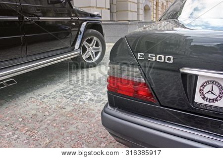 Kiev, Ukraine - September 6, 2013: Mercedes E500 W124 Wolf On The Background Of Beautiful Old Houses