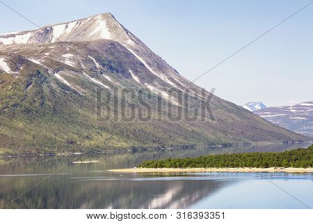 Sandy Beach At The Norwegian Lake Gjevilvatnet