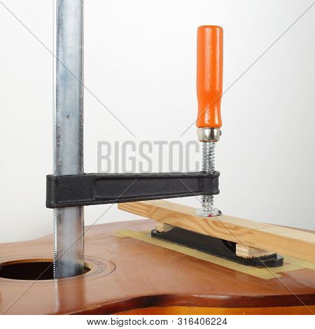 Guitar Repair And Service - Glue Fix Retro Acoustic Guitar Bridge