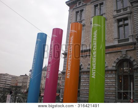 March 23, 2013. Antwerp, Belgium. Vacation Nature Street Photography.  Curious Signposts Next To The