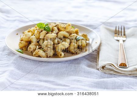Traditional Soviet Russian Pasta Dish, Vermicelli, Navy Pasta, With Meat On A White Plate On A Light