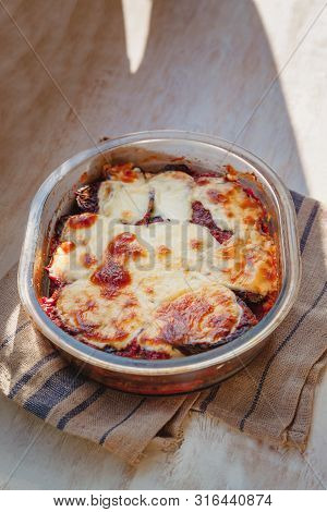 Eggplant Alla Parmigiana Melanzane Close Up In Baking Dish. Horizontal. Delicious Eggplant Alla Parm