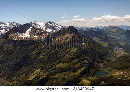 Views On Alps From Fronalpstock Peak Near Small Village Of Stoos In Central Switzerland