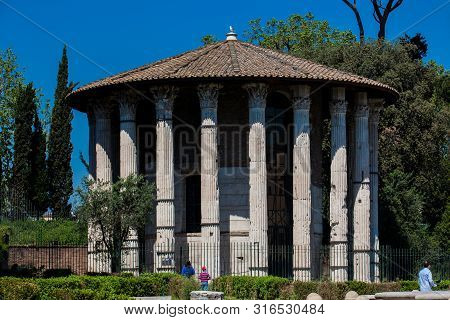 Rome, Italy - April, 2018: The Temple Of Hercules Victor Or Hercules Olivarius A Roman Temple In Pia