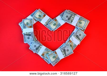 Self-interest. Love Of Convenience Or Marriage Of Convenience Concept With Heart Symbol With Dollar 