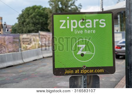 Washington, Dc - August 7, 2019: Sign Advertising That Zipcars Live Here. Zipcars Are A Car Sharing 