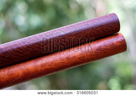 Wood Logs Round Lath Of Burma Padauk, Exotic Wooded Beautiful Pattern For Crafts Or Diy At Blured Ba