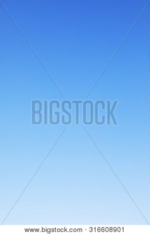 Clear Blue Sky Background And Empty Space For Your Design, No Cloud