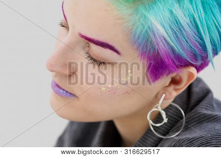 Young Beautiful Woman With Dyed Blue And Green Hair. Pixie Bob Short Haircut The Concept Of Hair Sty