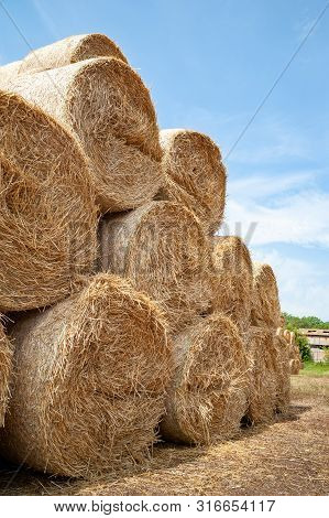 Close-up Of Hay Bales. Hay Bales Are Stacked In Large Stacks.
