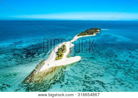 Truly Amazing Tropical Island In The Middle Of The Ocean. Aerial View Of An Island With White Sand B