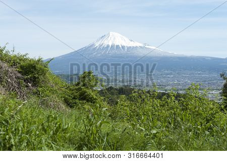Beautiful Landscape With Aerial View Of Fuji City, Japan. Vegetation And Mount Fuji In Day With Blue
