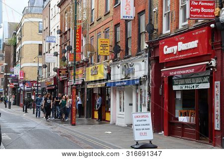 London, Uk - July 13, 2019: People Visit Brick Lane Street In Shoreditch District Of London. Shoredi