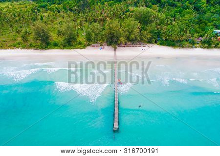 Tropical Sea Wave White Sand Beach With Green Tree Aerial View In Koh Kood