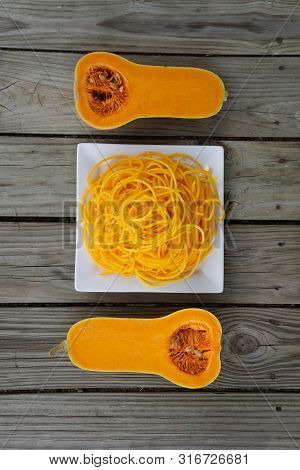 Top View Of Freshly Peeled Butternut Squash Noodles - Vegan And Gluten Free