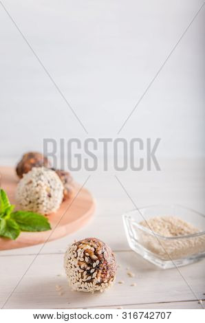 Vegetarian Food, Energy Balls Of Walnuts, Dates, Prunes, Cranberries, Honey With Sesame
