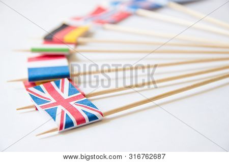 National Flag Of The United Kingdom Among Other Countries Flags On White Background.