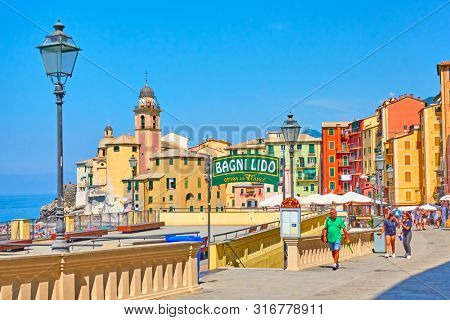 Camogli, Genoa, Italy - July 3, 2019:  Waterfront in Camogli town near Genoa on sunny summer day, Liguria