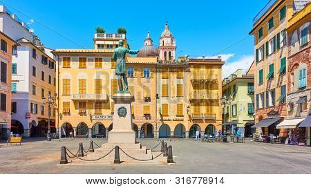 Chiavari,  Italy - July 3, 2019: Old square in Chiavari town near Genoa on sunny summer day, Liguria