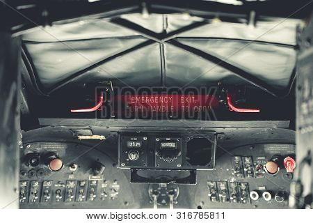 York, Uk - 6th August 2019: Ww2 Douglas Dakota Iv C-47b Cockpit With Message Emergency Exit Turn Han