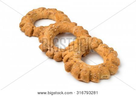 Fresh baked festive Moroccan Kaak, anise cookies, isolated on white background