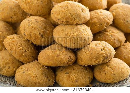 Traditional homemade Moroccan festive ghoriba cookies close up