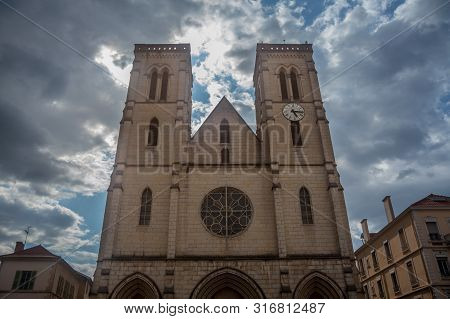 Eglise Saint Jean Baptiste Church At Dusk In Bourgoin Jallieu, France, A City Of Dauphine Region, In