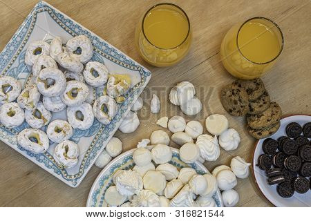 Rich, But A Lot Of Sugar On This Table Of Sweets And Natural Orange Juice