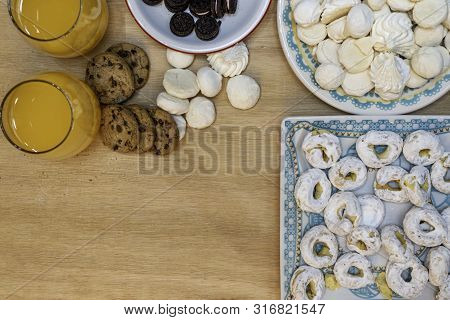 Rich, But A Lot Of Sugar On This Table Of Sweets And Natural Orange Juice