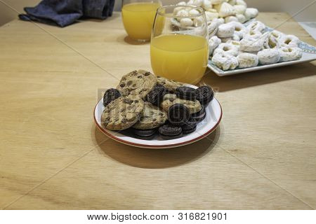 Rich, But A Lot Of Sugar On This Table Of Sweets And Natural Orange Juice