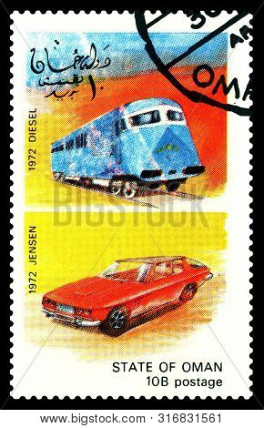 Stavropol, Russia - July 31. 2019: A Stamp Printed In State Of Oman Shows Antique Locomotive Diesel 