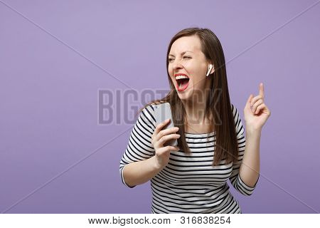 Young Brunette Woman Girl In Casual Striped Clothes Posing Isolated On Violet Purple Background Stud