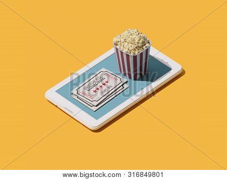 Movie Ticket Booking App: Popcorn And Movie Theater Tickets On A Smartphone