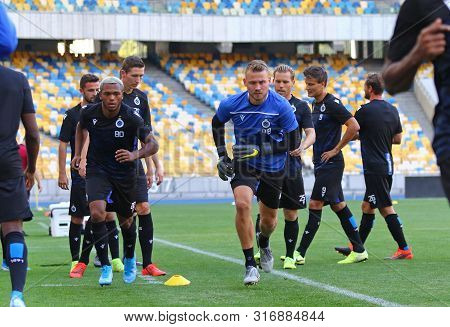 Kyiv, Ukraine - August 13, 2019: Lois Openda And Simon Mignolet Of Club Brugge In Action During The 