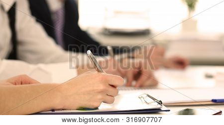 Focus On Tender Female Hand Holding Pen. Directors Signing Biz Documents Discussing Stipulation Of C