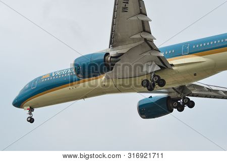 Passenger Airplane Landing At Saigon Airport