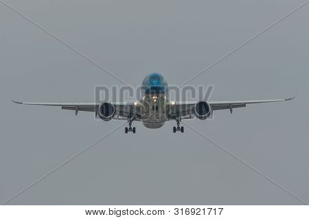 Passenger Airplane Landing At Saigon Airport